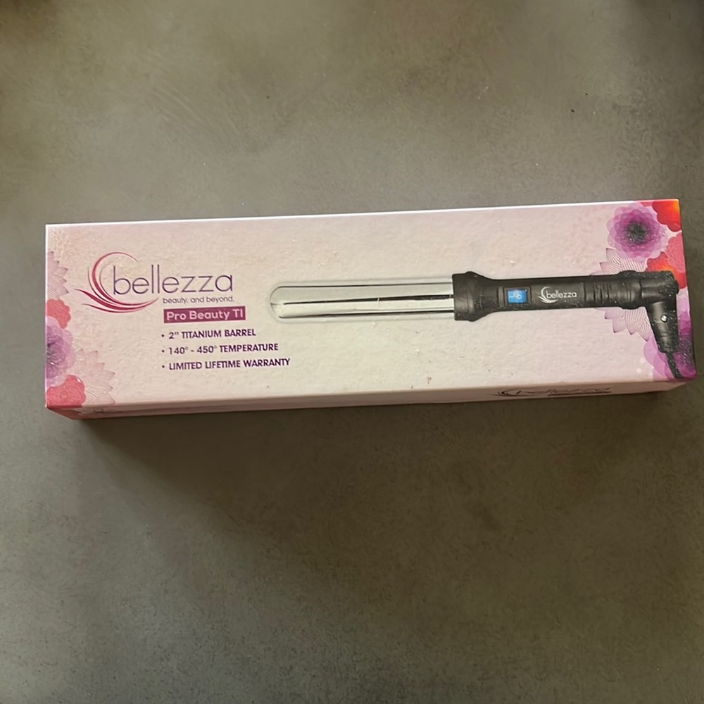 1.25” curling wand. Titanium barrel. Brand new. Belezzq.